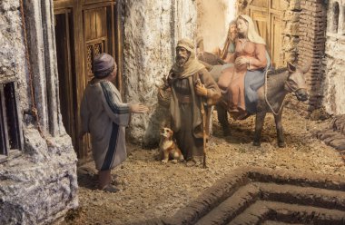 Christmas Nativity scene. Mary and Joseph's search for a place t clipart