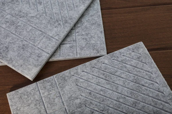 Acoustic panels made in the form of ceramic tiles