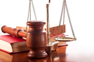 Gavel, scales and a book