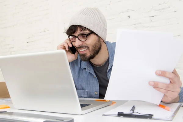 Hispanic attractive hipster businessman working at home office using mobile phone — Stock Photo, Image