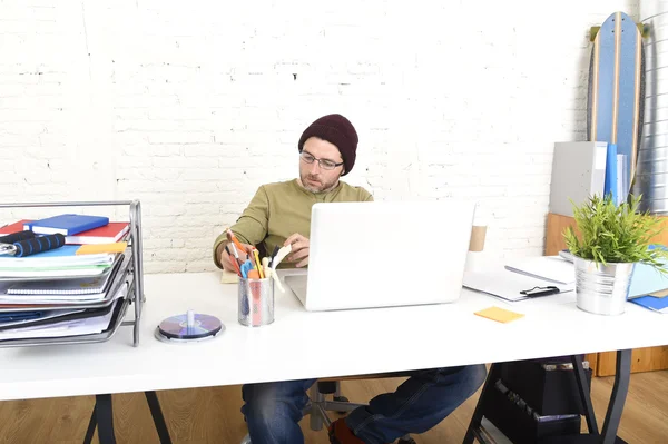 Young attractive hipster businessman working from his home office as freelancer self employed business model — Stock Photo, Image