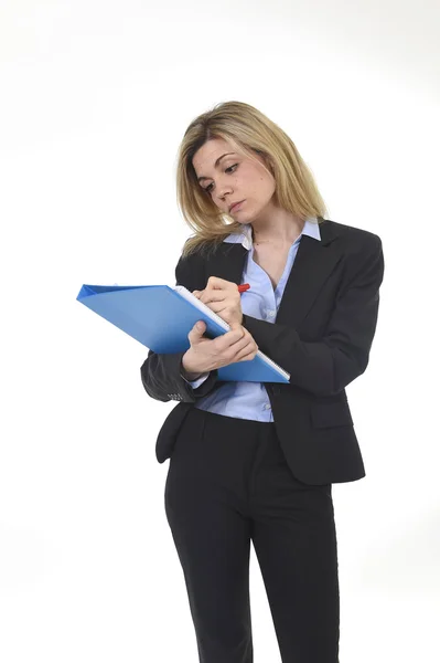 Attractive and thoughtful businesswoman with blue folder writing with pen business concept — Stock Photo, Image