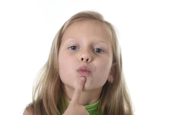 Cute little girl showing her lips in body parts learning school chart serie — Stockfoto