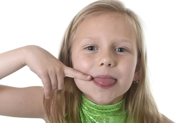 Linda niña apuntando su lengua en partes del cuerpo aprendizaje gráfico de la escuela serie —  Fotos de Stock