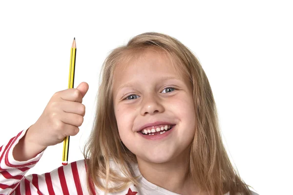 Söta vackra kvinnliga barn 6 till 8 år innehar penna skolan levererar koncept — Stockfoto