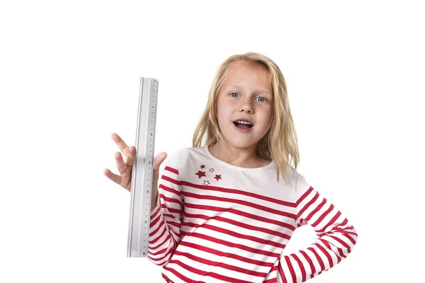 Sweet beautiful female child holding ruler school supplies concept — Stock Photo, Image