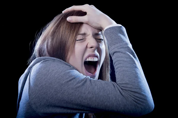 Teenager girl with red hair feeling lonely screaming desperate as bullying victim in depression — Stock Photo, Image