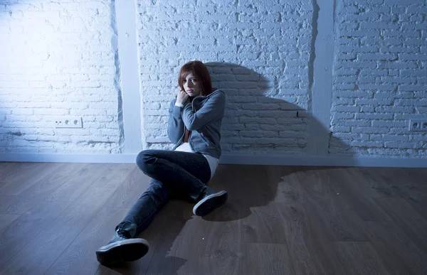 Teenager girl or young woman feeling sad and scared looking overwhelmed and depressed — Stock Photo, Image