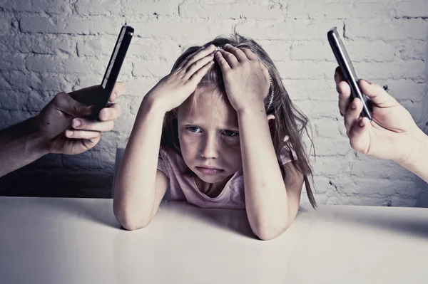 Hands of network addict parents using mobile phone neglecting little sad ignored daughter bored — Stock Photo, Image