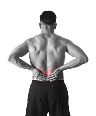 young muscular body sport man holding sore low back waist are suffering pain in athlete stress