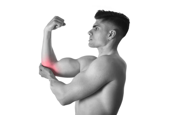 Muscular body man holding elbow sore in pain in body health care and sport medicine — Stock Photo, Image