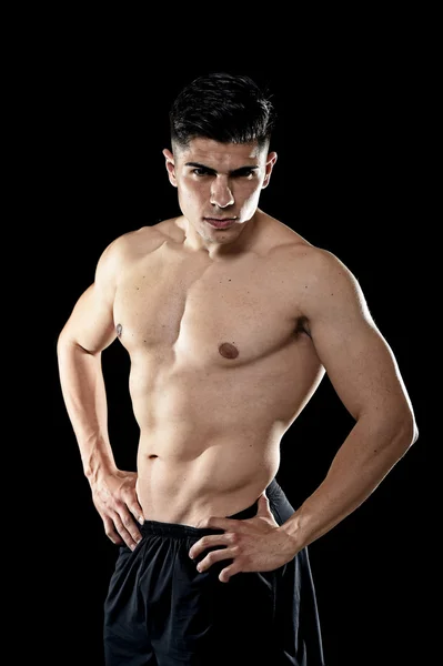 Handsome sport man posing with strong naked torso looking cool defiant fit body concept — Stock Photo, Image