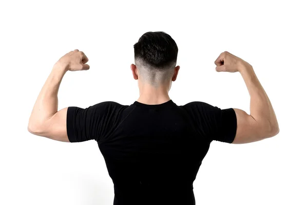 Homem desportivo atraente vestindo t-shirt preta com espaço de cópia para — Fotografia de Stock