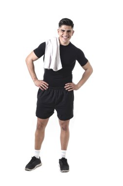 young attractive sport man with fit strong body holding towel on his shoulder smiling happy
