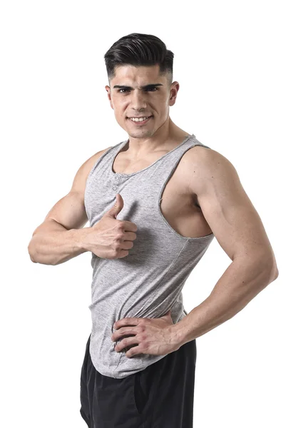 Homem esporte atraente com corpo atlético grande e forte sorrindo feliz vestindo singlet dando o polegar para cima — Fotografia de Stock