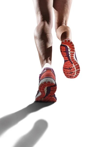 Vista trasera de cerca fuerte atlético piernas femeninas correr zapatos deporte mujer trotar —  Fotos de Stock