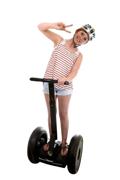 Young tourist woman wearing safety helmet doing peace hands sign smiling happy riding electrical segway — Stock Fotó