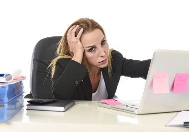 worried attractive businesswoman in stress working with laptop c