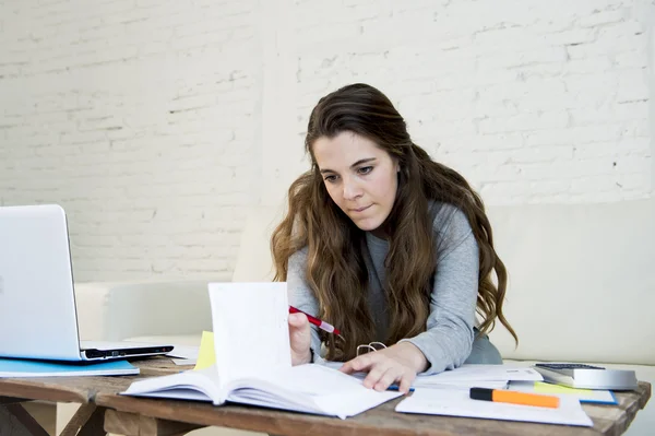 Young worried woman suffering stress doing domestic accounting paperwork bills — Stock Fotó