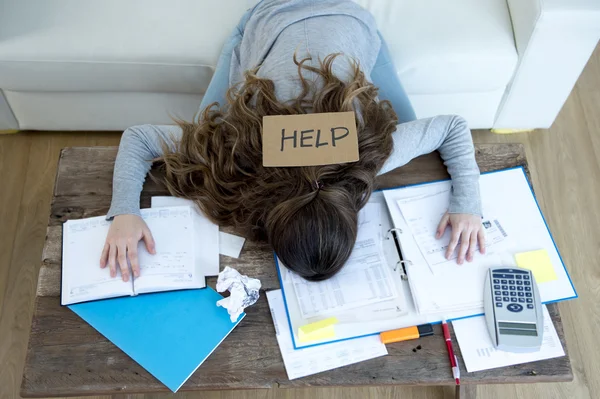 Young woman asking for help suffering stress doing domestic accounting paperwork bills — Stok fotoğraf