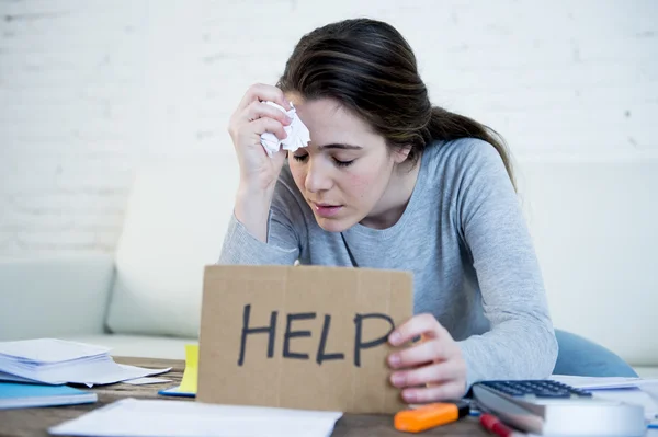 Young woman asking for help suffering stress doing domestic accounting paperwork bills — Stock fotografie