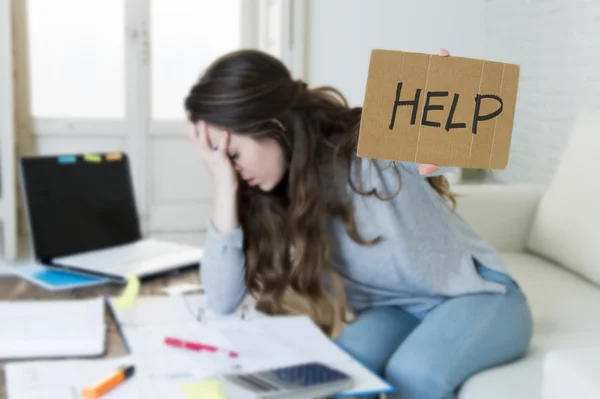 Young woman asking for help suffering stress doing domestic accounting paperwork bills — Stockfoto