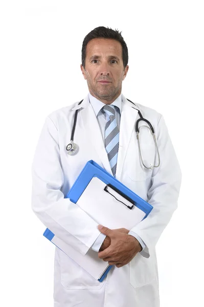 Corporate portrait of confident 40s attractive male medicine doctor with stethoscope with clipboard — Stock Photo, Image