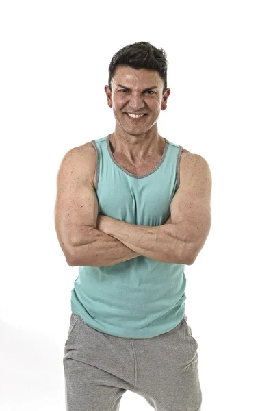 40s homem fisiculturista sorrindo feliz em corporativa cruz braços pose vestindo singlet — Fotografia de Stock