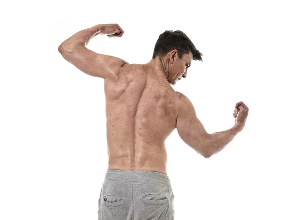 Άνθρωπος Ισπανόφωνος αθλητισμού και bodybuilder στη στάση εταιρική θέτουν wi — Φωτογραφία Αρχείου