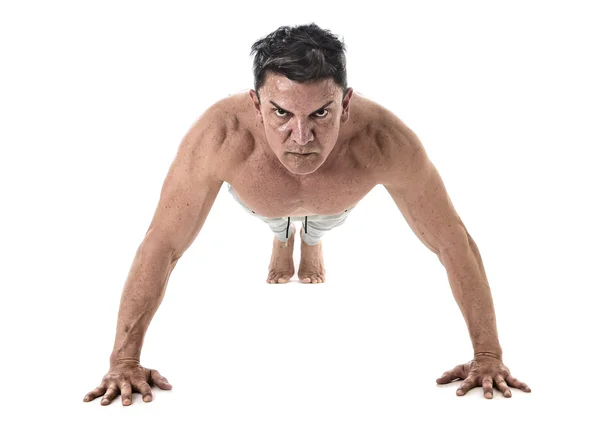 40 to 45 years old fit man doing push up workout training fitness routine with strong muscular body — Stock Photo, Image