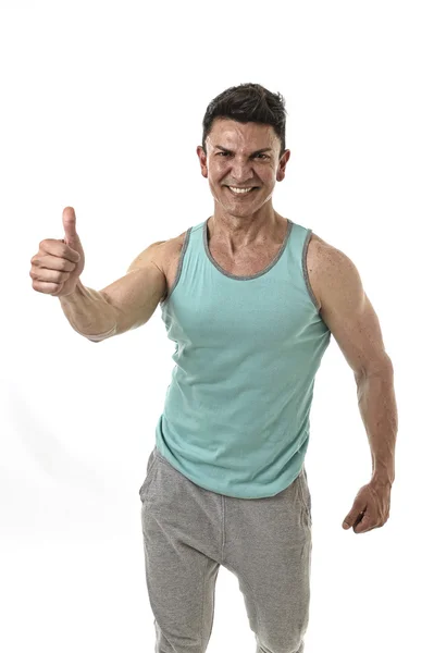 40s hispanic sport man and bodybuilder smiling happy corporate pose giving thumb up — Stock Photo, Image