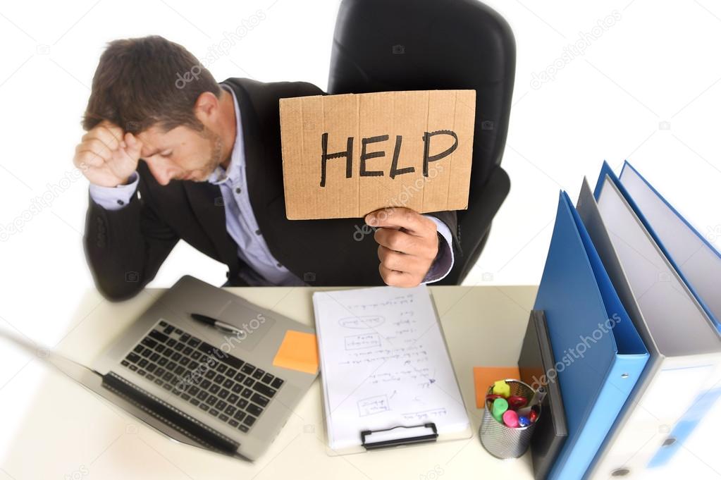 young desperate businessman suffering stress working at office c