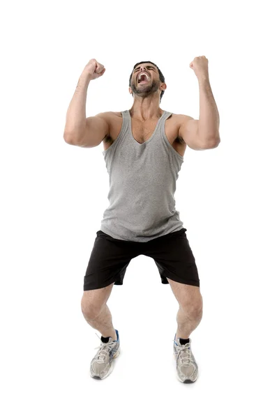 Young strong and fit sport man celebrating victory on running race — Stock Photo, Image