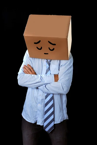 Homem de negócios bagunçado com caixa de papelão na cabeça triste expressão desenhar — Fotografia de Stock