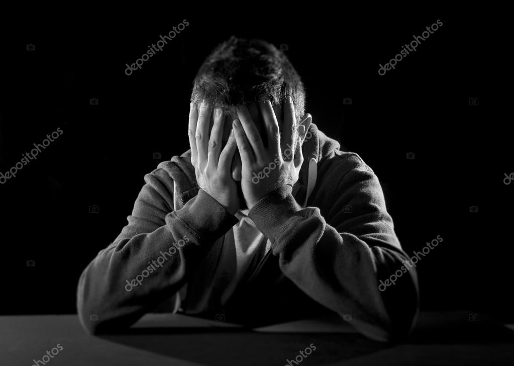 Desperate man suffering emotional pain, grief and deep depression Stock  Photo by ©focuspocusltd 52634173