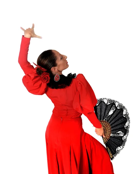 Молодая испанка танцует фламенко в типичном народном красном платье — стоковое фото