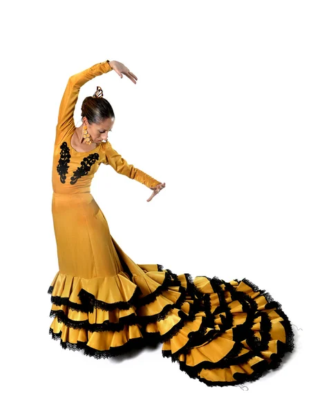 Jonge Spaanse vrouw flamenco dansen in typische folk staart jurk jurk — Stockfoto