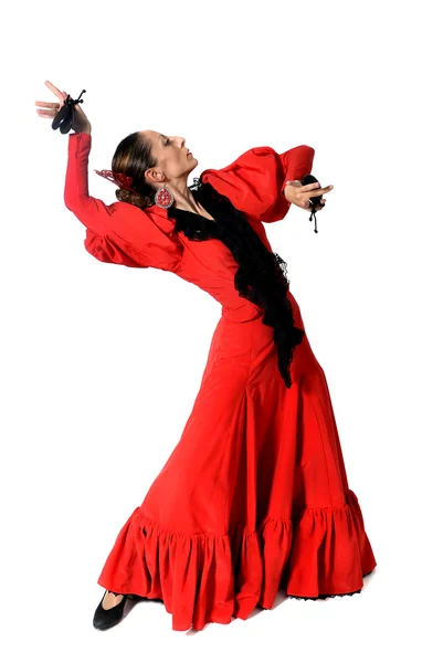 Mujer española joven bailando flamenco con castañuelas en las manos — Foto de Stock