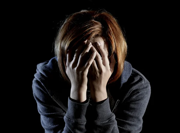 Close up woman suffering depression and stress alone in pain and grief — Stock Photo, Image