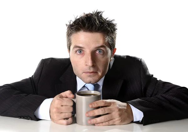 Addict businessman holding cup of coffee anxious and crazy in caffeine addiction — Stock Photo, Image