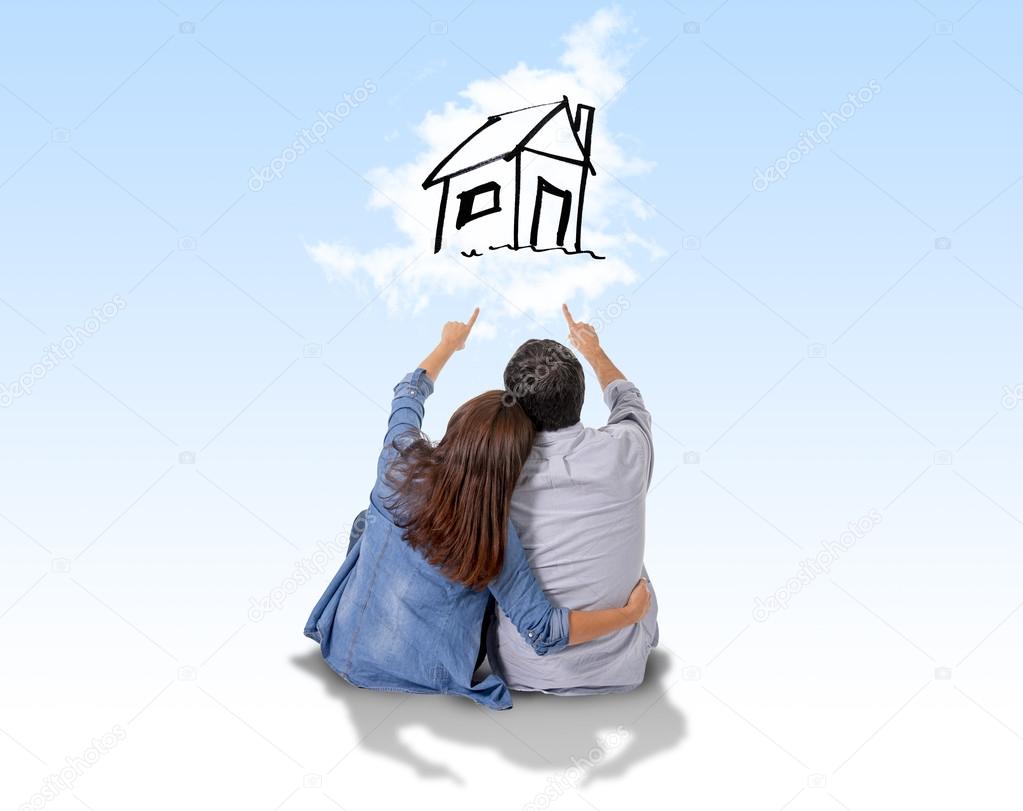 Young couple dreaming and imaging their new house in real state Stock ...