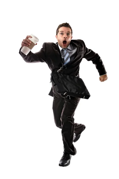 Joven atractivo hombre de negocios con llevar café que llega tarde al trabajo en el estrés —  Fotos de Stock