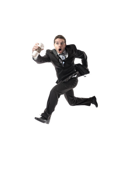 young attractive businessman with take away coffee running late to work  in stress
