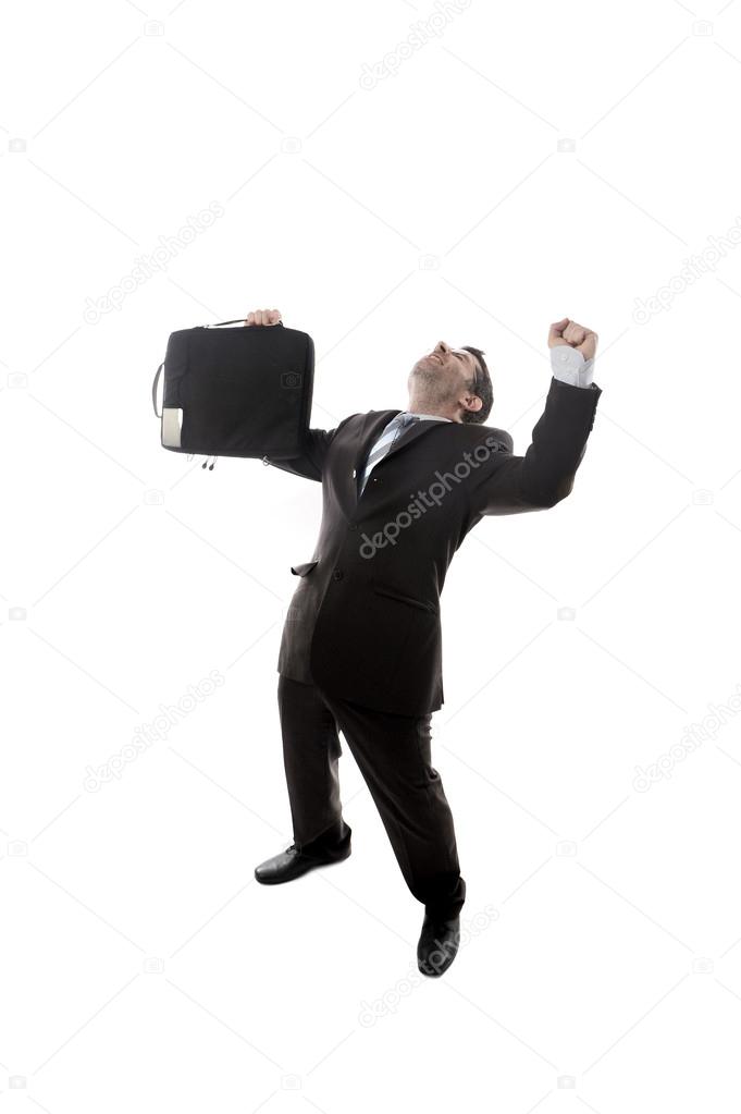 young happy and excited businessman holding suitcase celebrating promotion and success at work