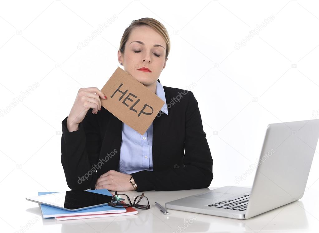 young stressed businesswoman holding help sign overworked at office computer