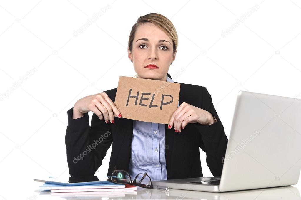 young stressed businesswoman holding help sign overworked at office computer