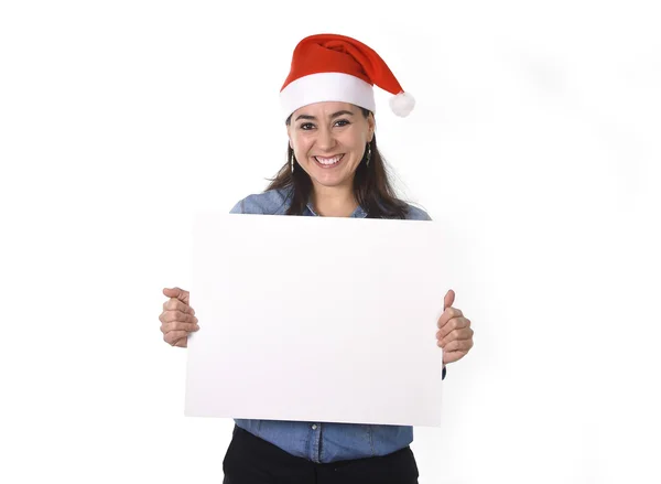 Young sweet Latin woman in Santa Christmas hat holding blank bil — Stock Photo, Image