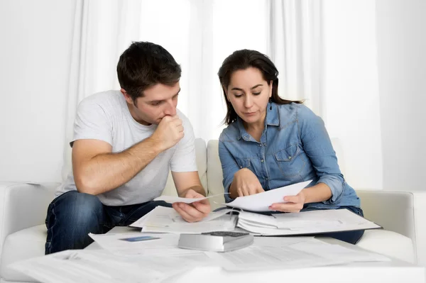 Young couple worried at home in stress accounting bank payments — Stock Photo, Image