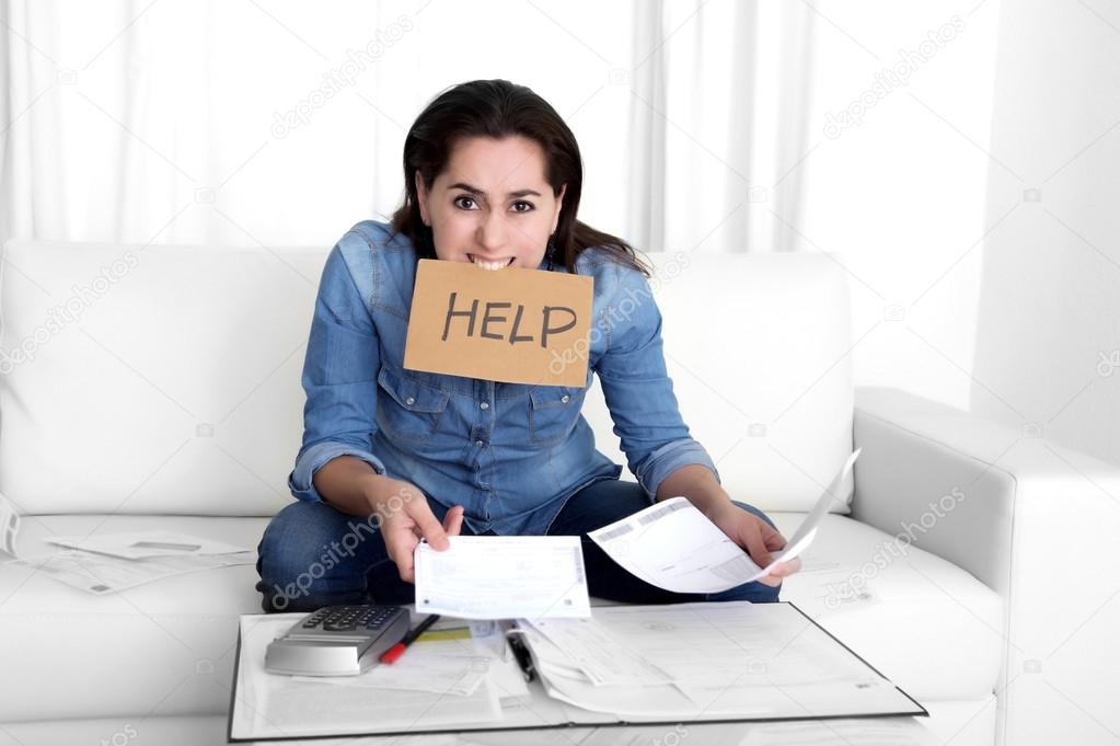 young woman worried at home in stress accounting desperate in financial problems