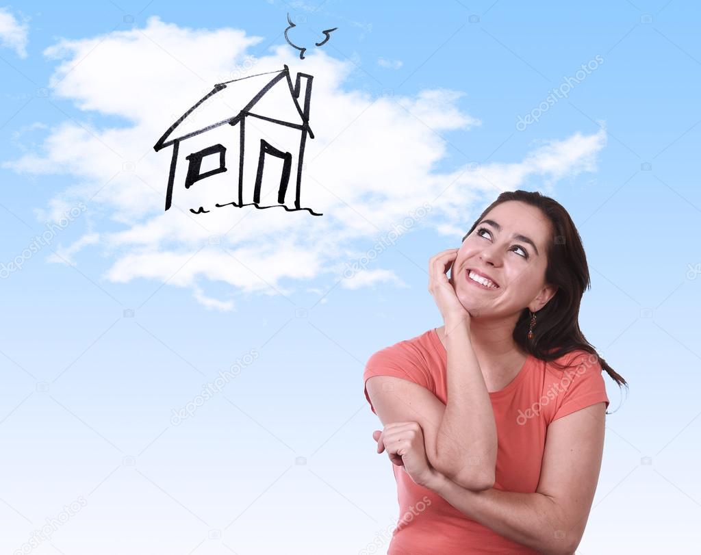  happy Latin woman dreaming of new house real estate concept